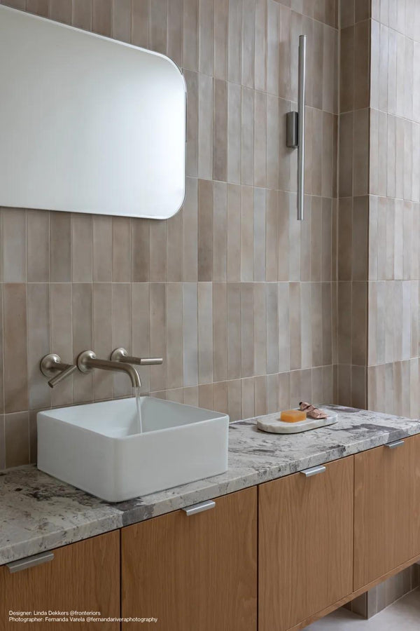 Why Vertically Stacked Tile Designs Are Trending In Bathrooms And Kitchens