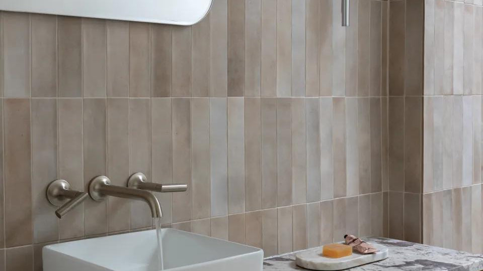 Why Vertically Stacked Tile Designs Are Trending In Bathrooms And Kitchens