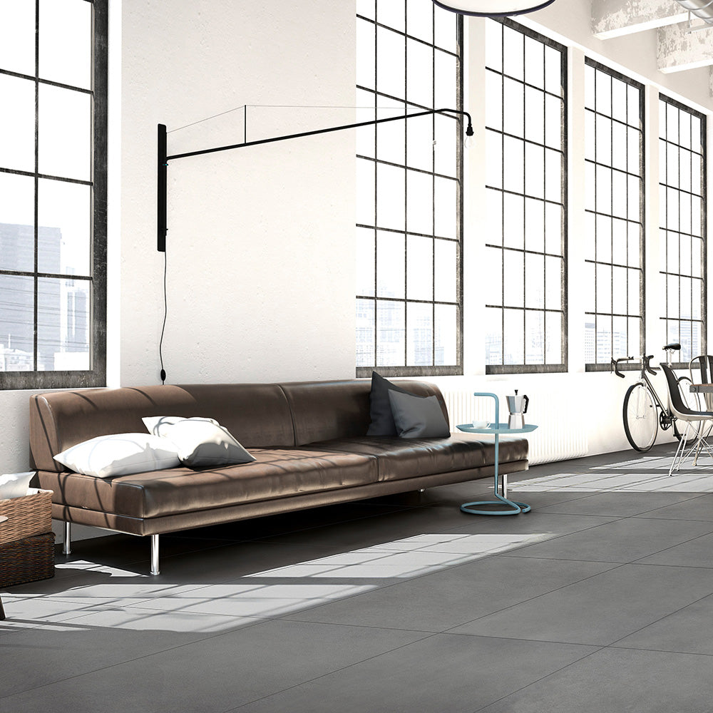 The Urban Living collection embodies the raw, industrial appeal of concrete-look tiles, making it a perfect fit for contemporary, rustic, and transitional spaces. Its sleek and modern finish adds depth and character to any room.