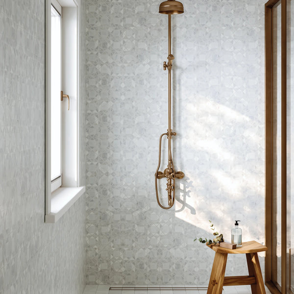The Monet stone tile collection merges traditional, art deco, and transitional styles, making it a timeless and sophisticated choice for any design.