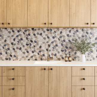 The Waterbrook stone and pebble tile collection is perfect for contemporary, farmhouse, coastal, transitional, and rustic settings, bringing natural elegance indoors.