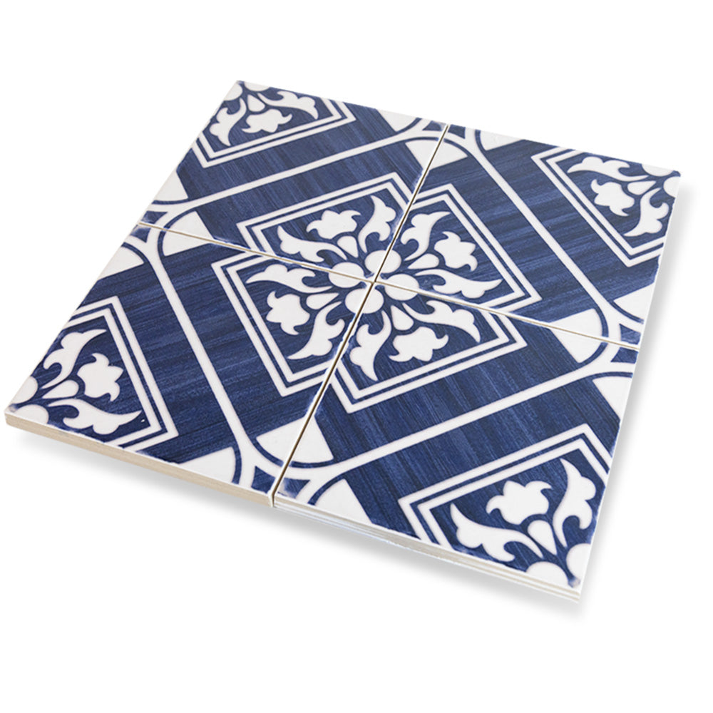 From a detailed macro perspective, the Andratx Telmo Navy 6x6 glossy porcelain tile captures its deep blue tone and glossy texture, adding depth and vibrancy.