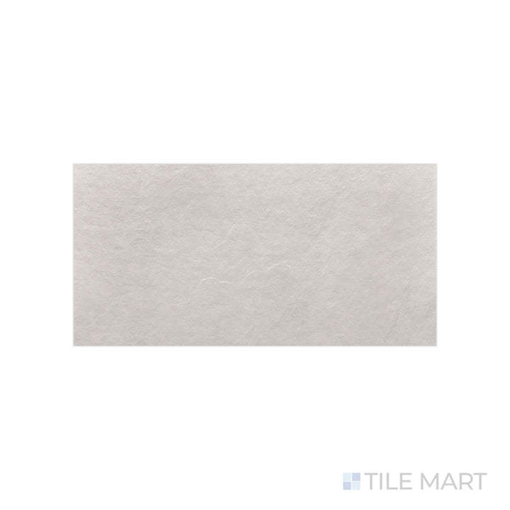 A crisp white finish with a soft matte effect is detailed in this close-up of Ash White 12x24 matte porcelain tile, emphasizing its subtle surface texture.