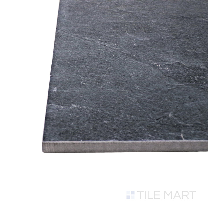 A corner shot of the Ash Black 24x48 matte porcelain tile highlights its deep black tone and smooth matte surface, offering a bold, contemporary look with a refined finish.