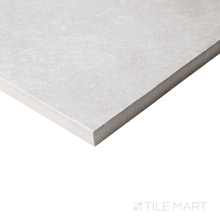 Viewed from an angled perspective, the silver porcelain surface showcases its soft matte sheen and contemporary appeal.