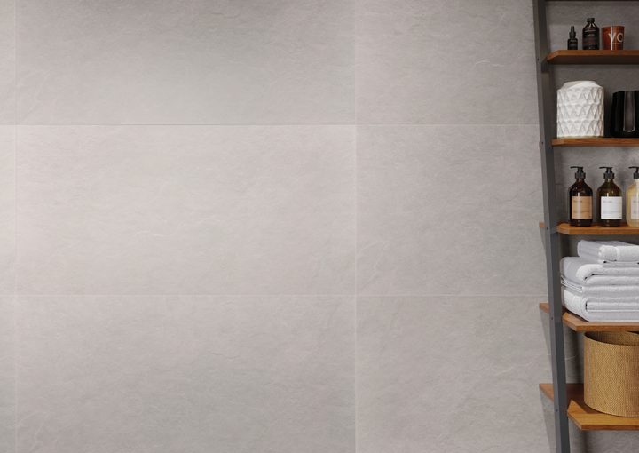 A serene and modern space highlighted by Ash White 24X48 matte porcelain tiles, delivering a crisp, clean aesthetic with a touch of minimalist charm.