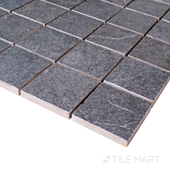 With a detailed angled view, the deep black square mosaic pattern stands out, emphasizing its uniform design and matte finish.