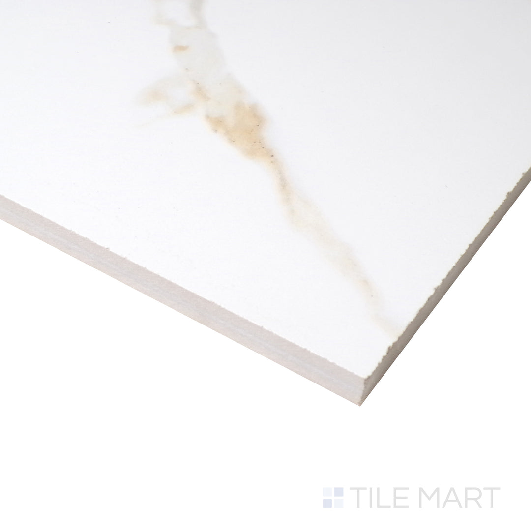 An angled view enhances the luxurious gold tones of this large-format matte porcelain tile, highlighting its subtle texture.