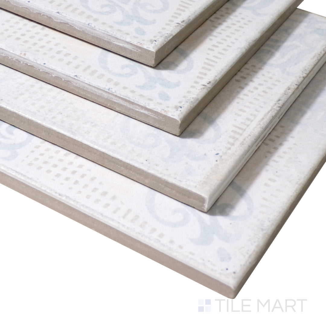 Seen from a side perspective, the textured pattern of this matte porcelain tile brings depth and dimension to its detailed design.