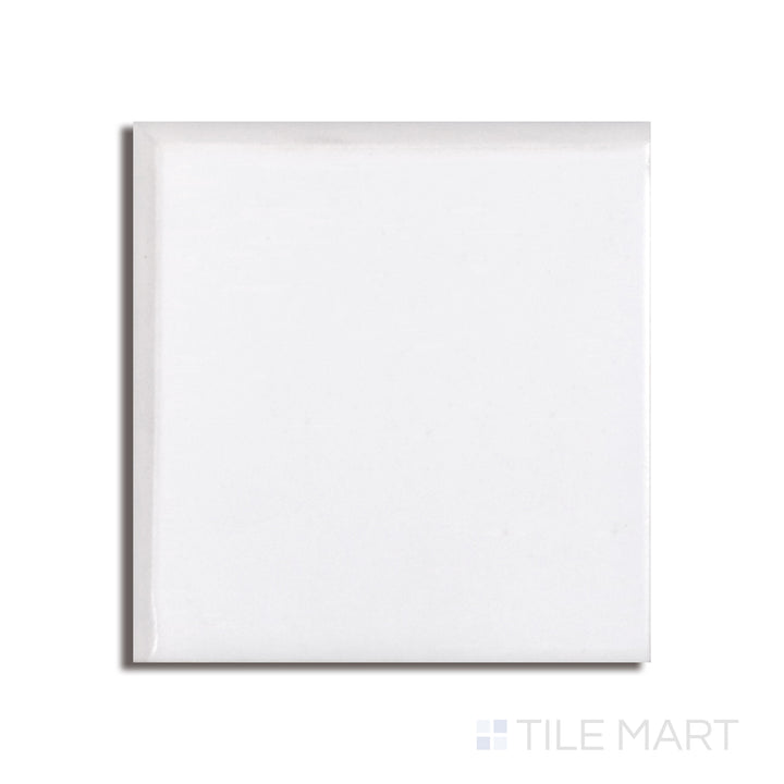 Overhead shot of Basics White 3X3 Glossy Ceramic Bullnose, featuring a compact size with a polished surface and rounded bullnose edge.