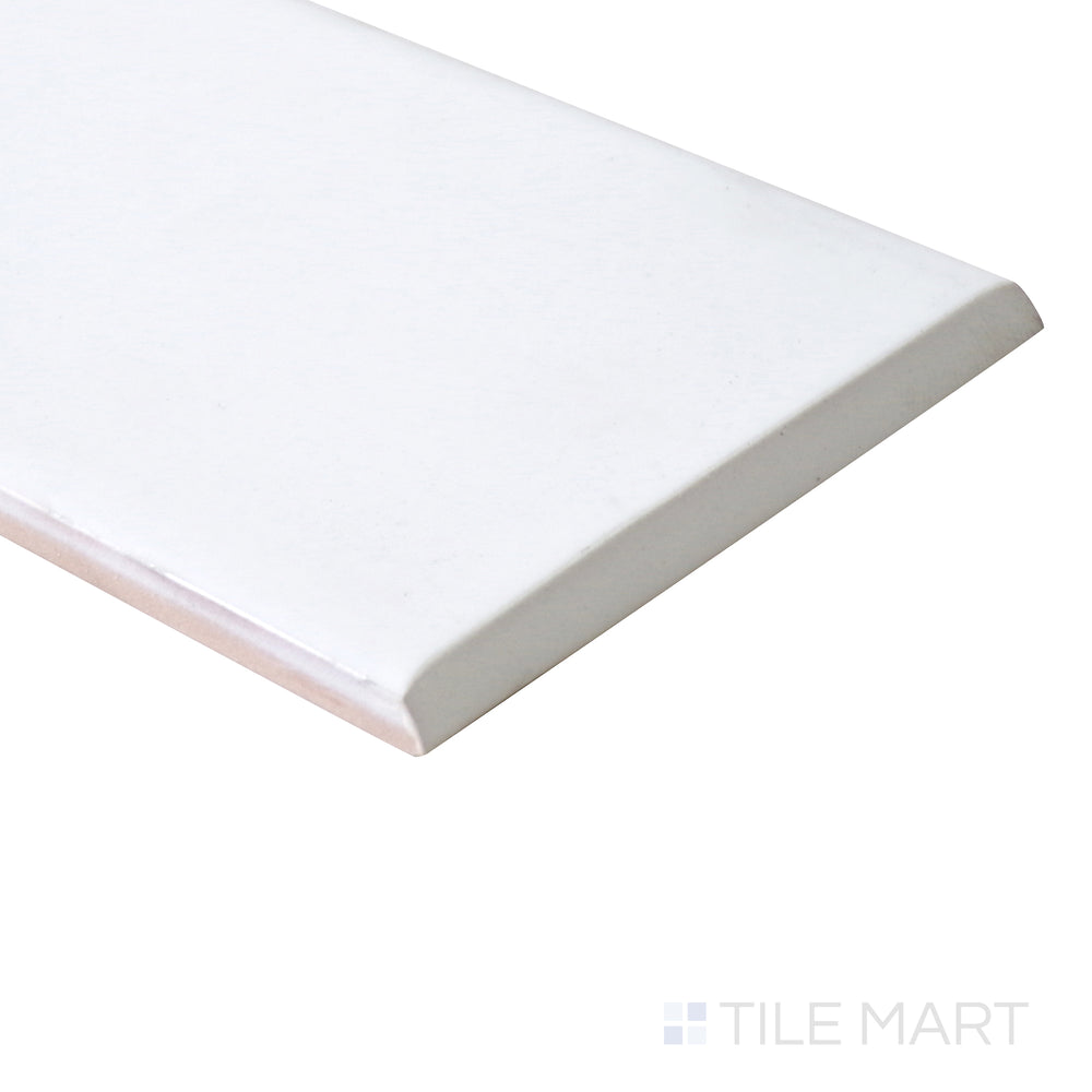 A polished bullnose detail is captured at an angle, creating a smooth and refined transition on this matte ceramic tile.