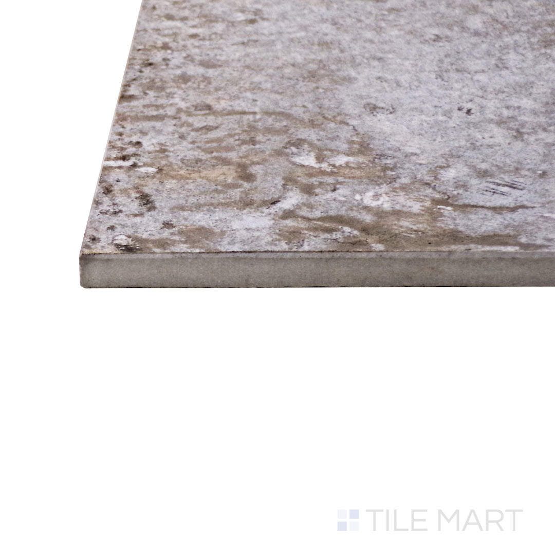 A corner shot of the Brooklyn Cemento Argent 24x48 honed porcelain tile highlights its sleek gray tone and soft honed finish, offering a refined and industrial-inspired aesthetic.