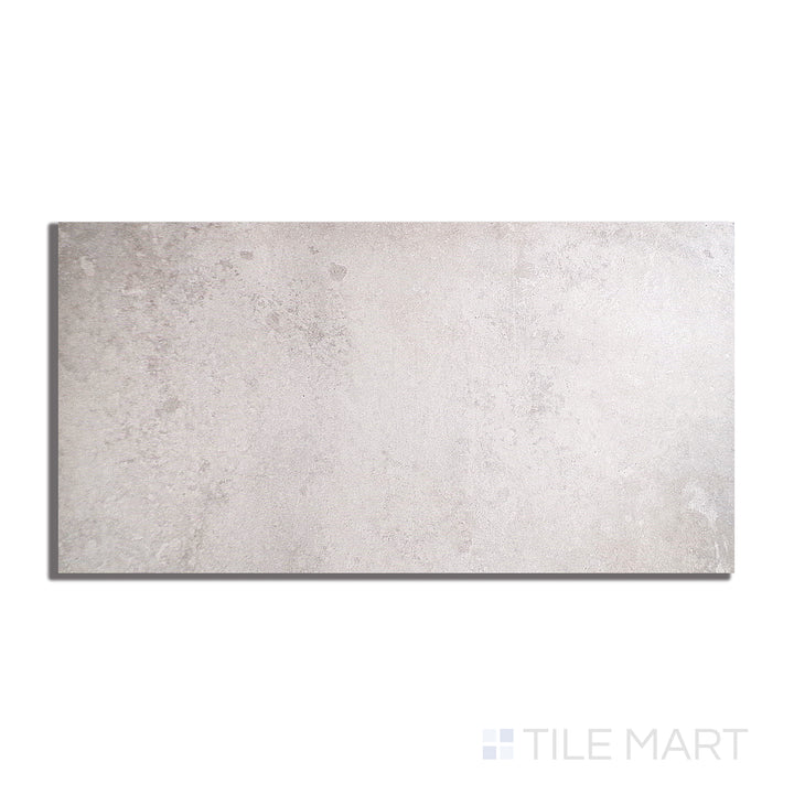 Flat lay of Brooklyn Cemento Argent 24X48 Honed Porcelain, highlighting its sophisticated grey hue and soft honed texture for contemporary spaces.