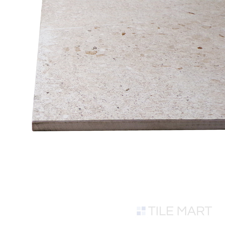 A corner shot of the Brooklyn Cemento Sand 24x48 honed porcelain tile highlights its warm beige tones and subtle texture, bringing a natural and inviting feel to walls and floors.