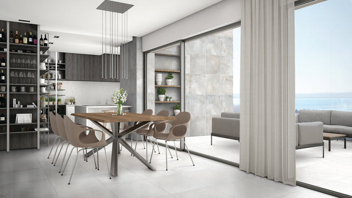 A bright and contemporary space highlighted by Brooklyn Cemento White 24X48 honed porcelain tiles, offering a refined and airy aesthetic with soft cement-inspired textures.