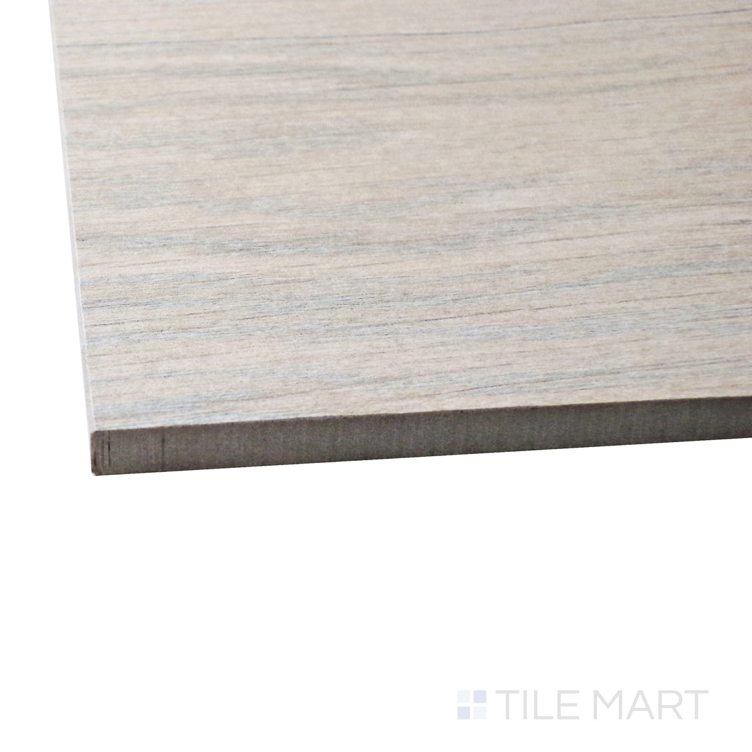 A corner shot of the Century Wood Look Natural 9.84x59.1 matte porcelain tile highlights its warm, natural wood grain texture with a soft matte finish, delivering a timeless and organic appeal.