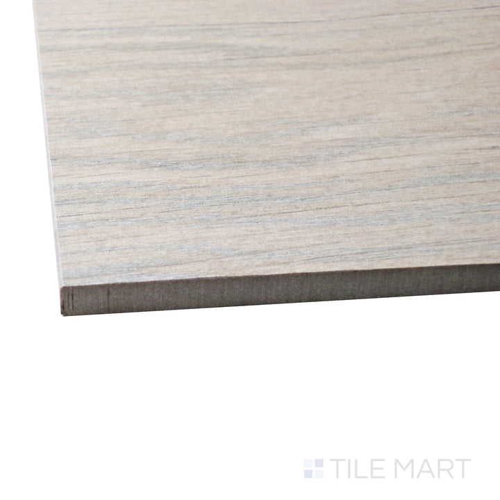 A corner shot of the Century Wood Look Natural 9.84x59.1 matte porcelain tile highlights its warm, natural wood grain texture with a soft matte finish, delivering a timeless and organic appeal.