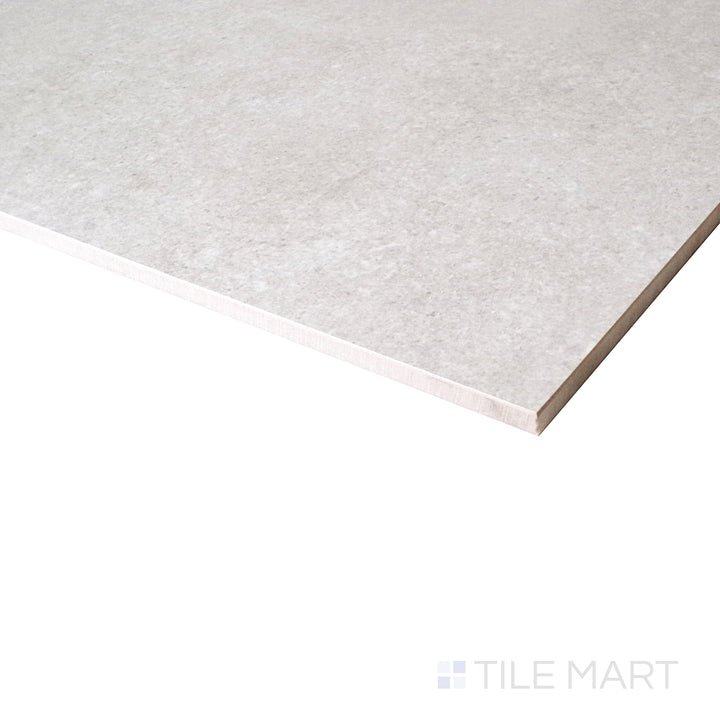 The soft beige tones and matte finish create a natural stone effect, enhanced by this side perspective.