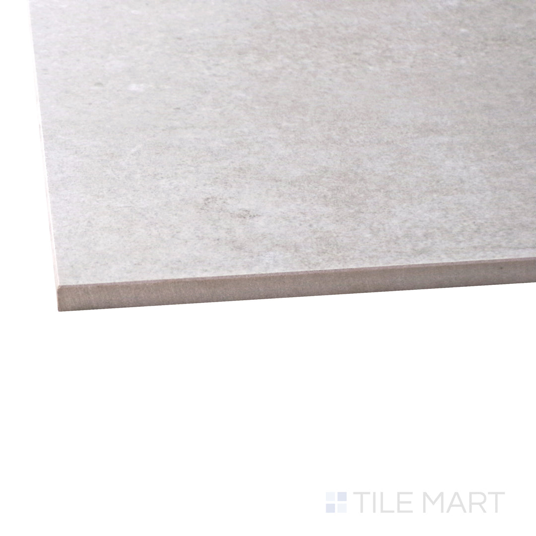 Captured from a corner angle, the Concrete Beige 48x48 matte porcelain tile showcases its warm beige hues and subtle cement-like texture, ideal for neutral and modern interiors.