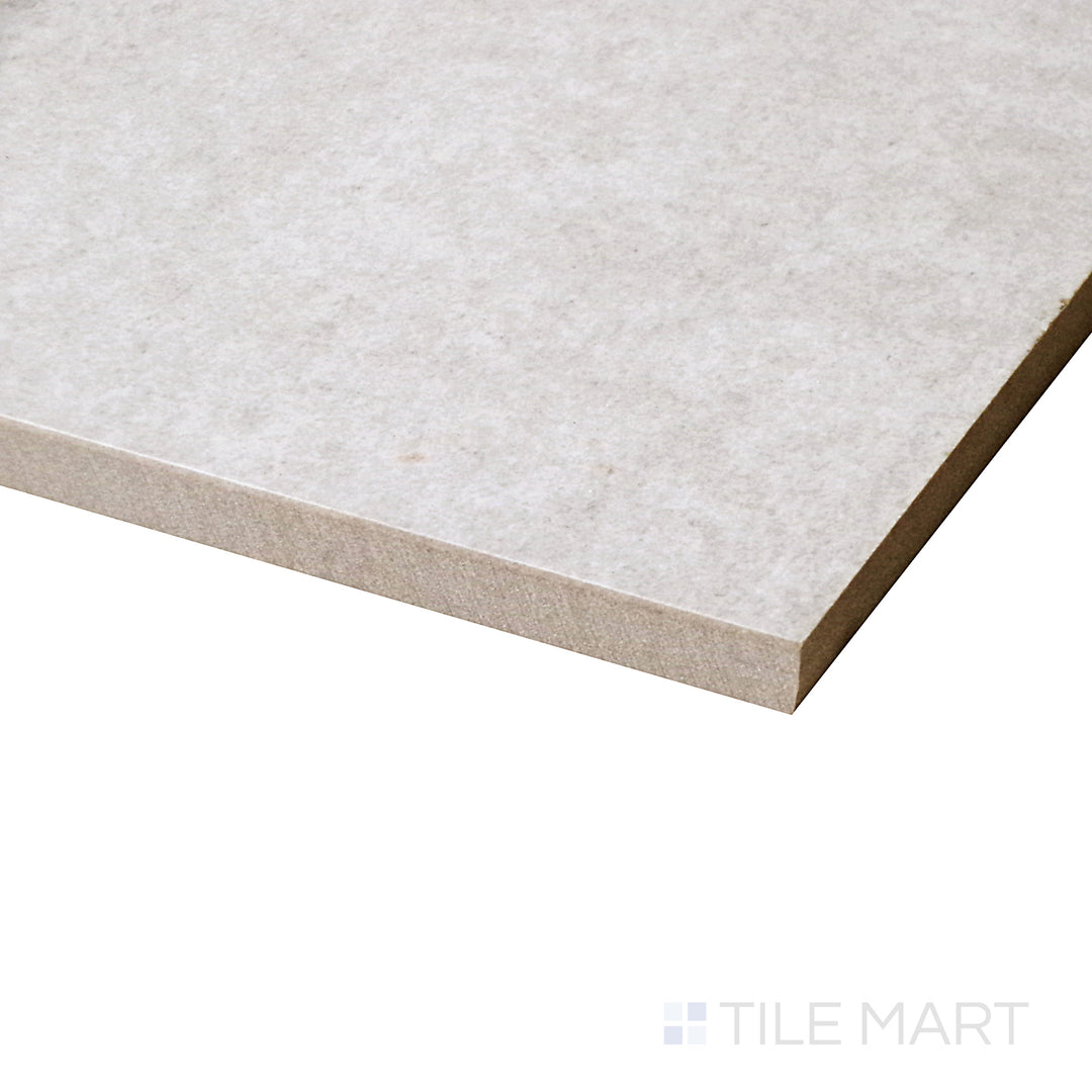 A soft gray hue extends seamlessly across the surface, with a matte texture subtly highlighted in this angled shot.