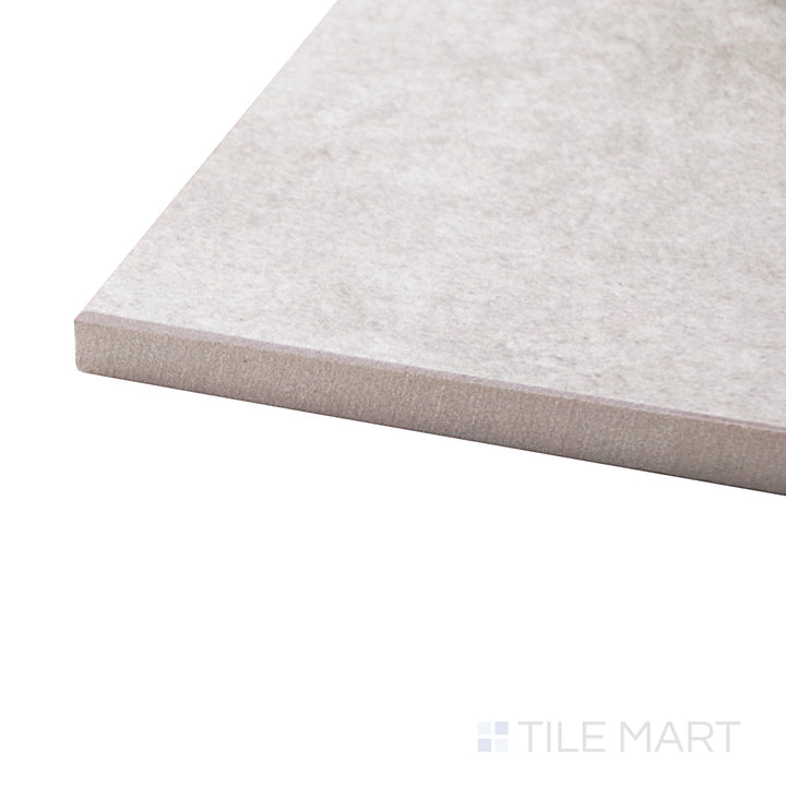 A corner perspective of the Concrete Beige 12x24 matte porcelain tile emphasizes its warm beige tone and subtle stone-like texture, offering a balanced and inviting look.