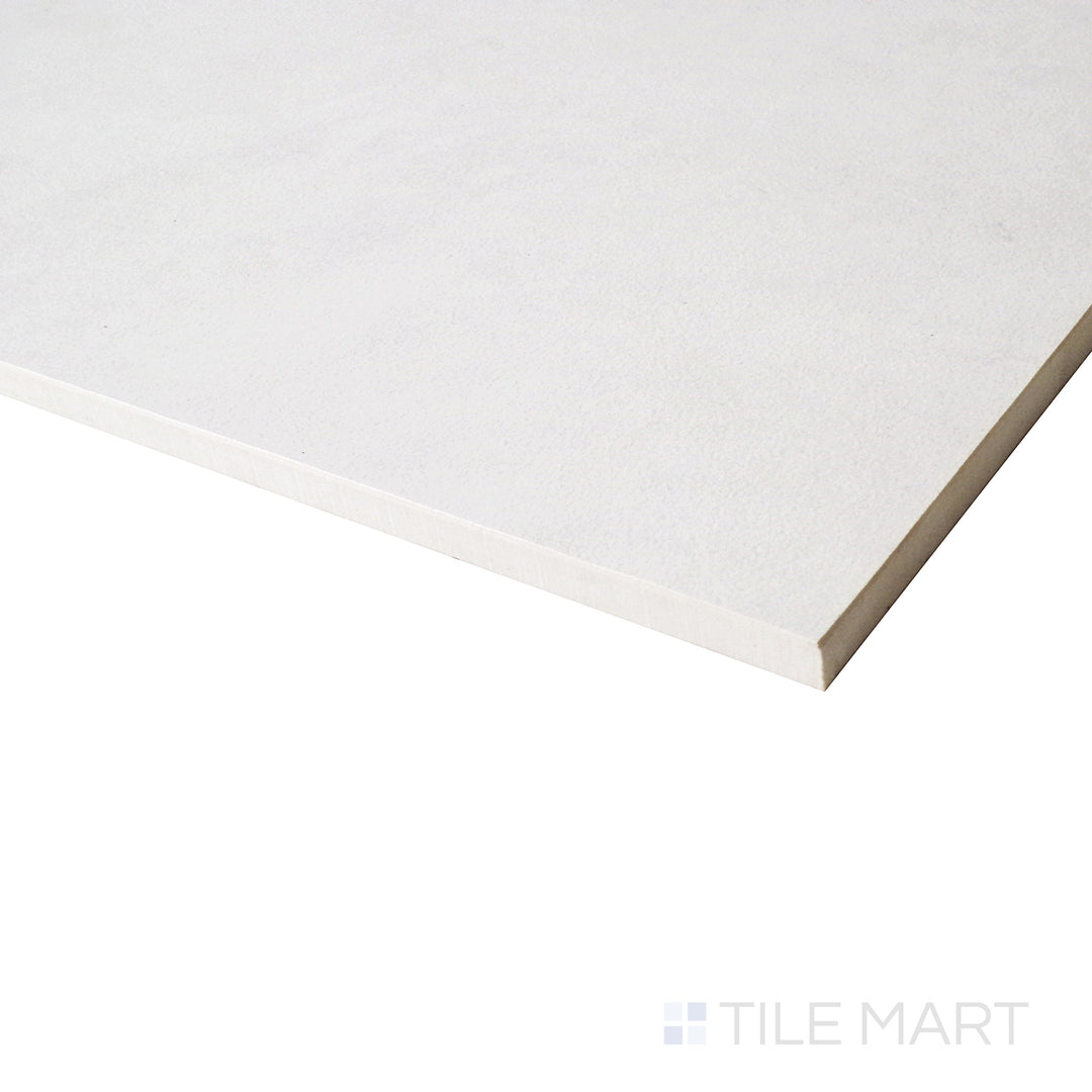 A carefully angled shot highlights the soft matte finish and neutral tones of this large-format tile, bringing out its refined texture.