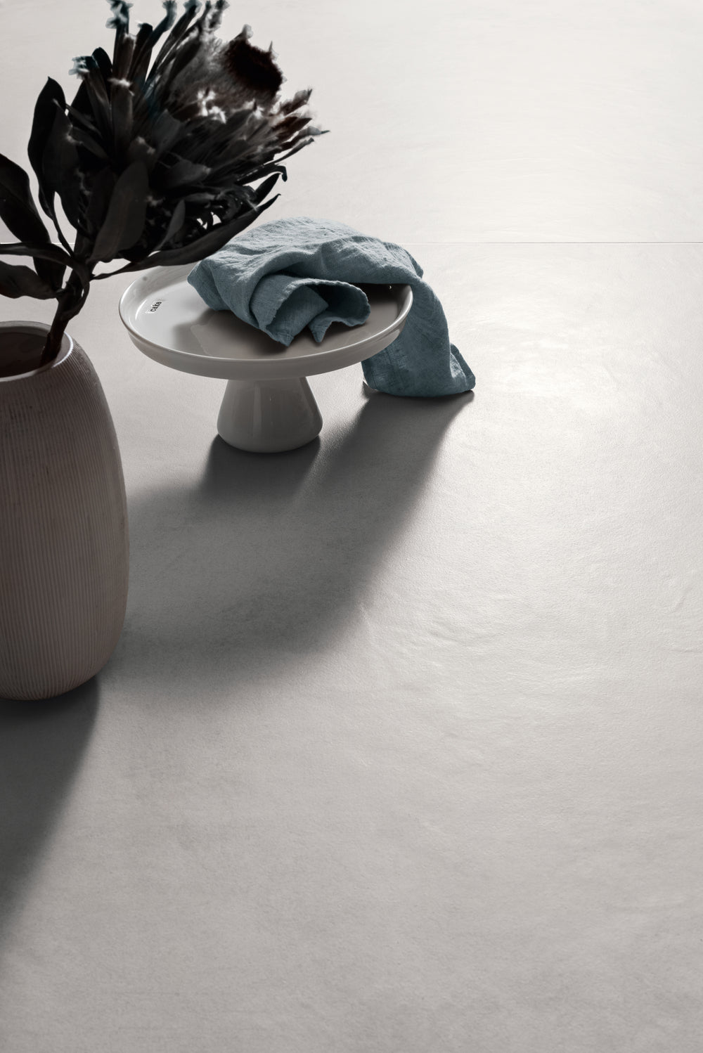 A sophisticated lifestyle image capturing the subtle elegance of Creos Bride matte porcelain, bringing modern charm to any space.