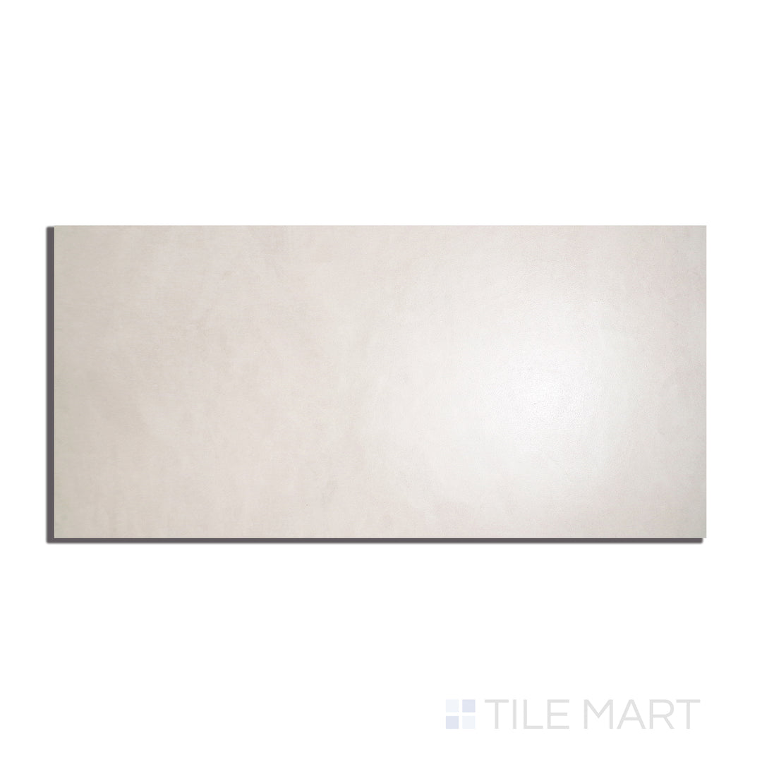 Close-up top-view of Creos Cookie 12X24 Matte Porcelain, emphasizing soft warm hues and a smooth matte texture for a timeless appeal.