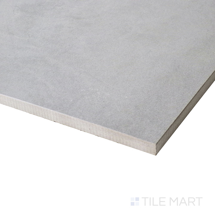 From a side perspective, this rectangular matte porcelain tile exudes modern elegance with its soft, neutral hues.