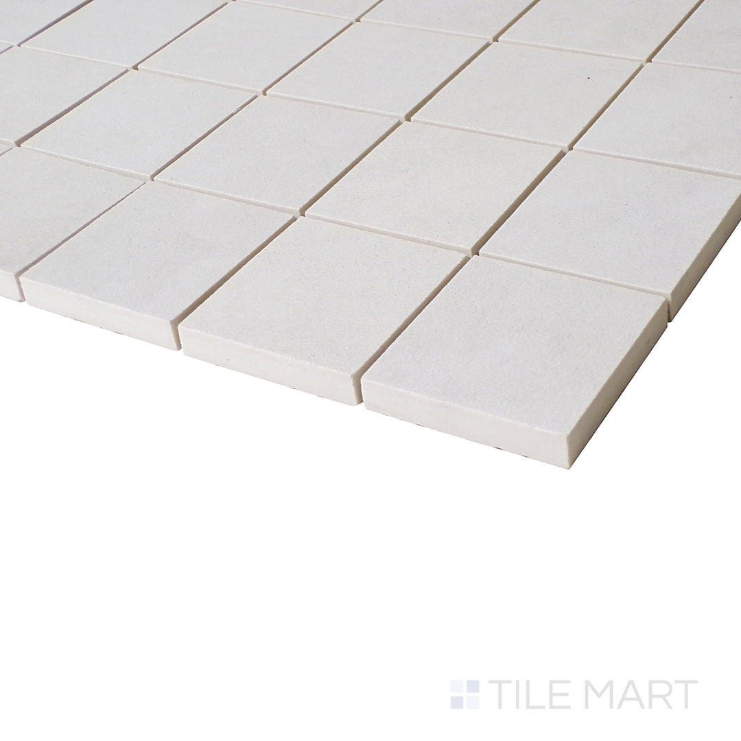 A zoomed-in angle highlights the delicate grid-like arrangement, enhancing the clean, matte surface with a sophisticated feel.