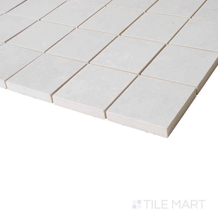 A zoomed-in angle highlights the delicate grid-like arrangement, enhancing the clean, matte surface with a sophisticated feel.