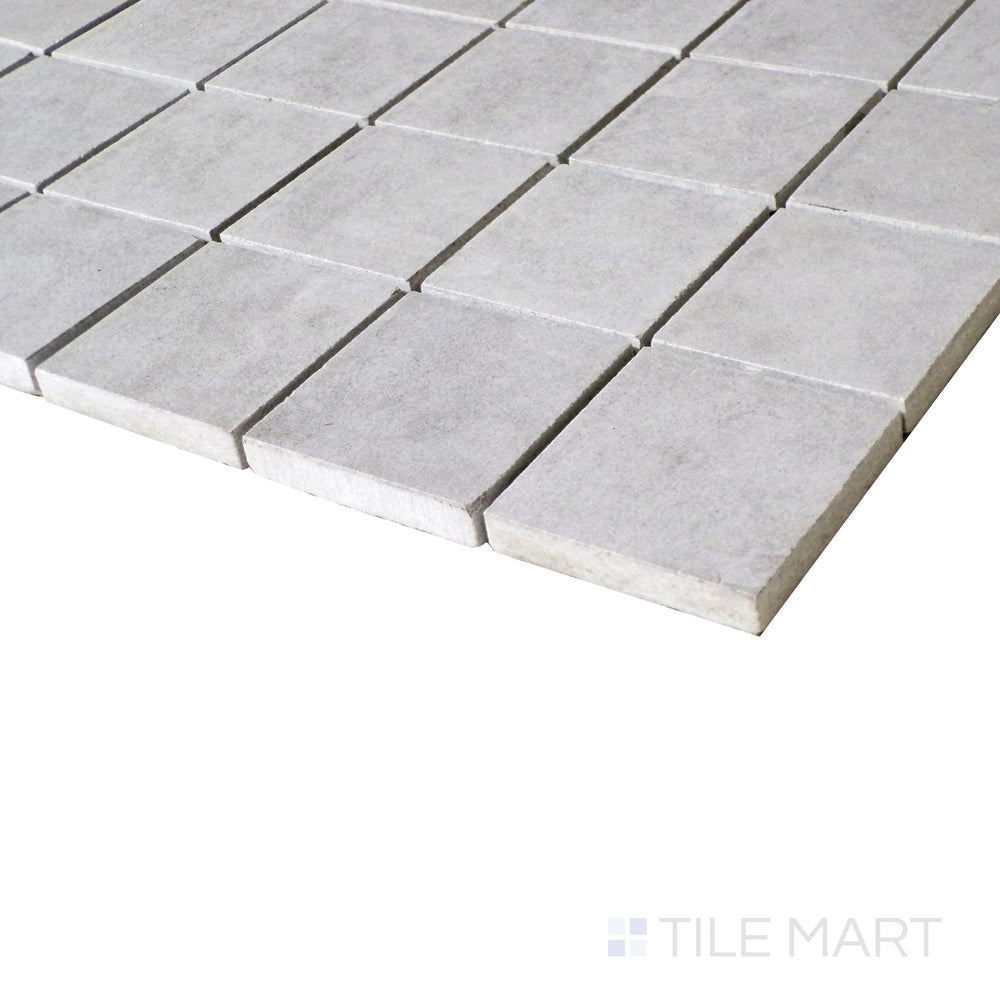 A refined close-up showcases the uniformity and elegance of this square mosaic, with a matte surface that exudes contemporary charm.