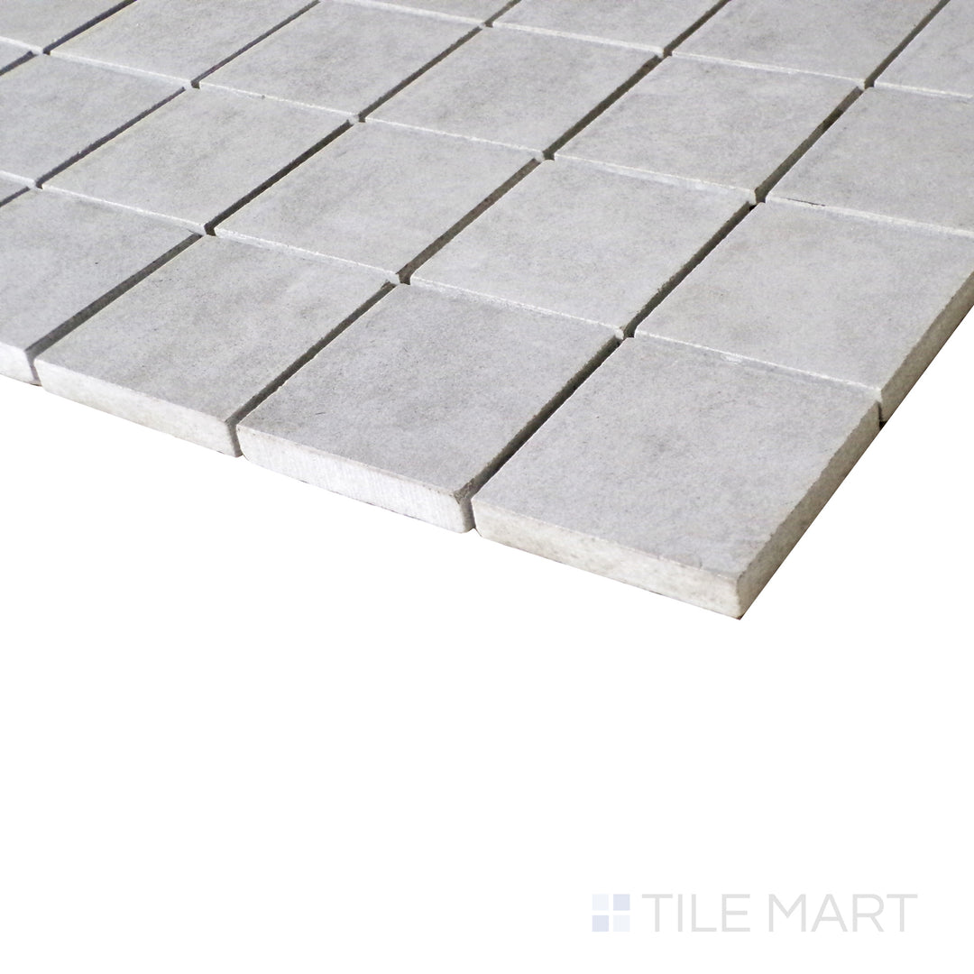 A refined close-up showcases the uniformity and elegance of this square mosaic, with a matte surface that exudes contemporary charm.