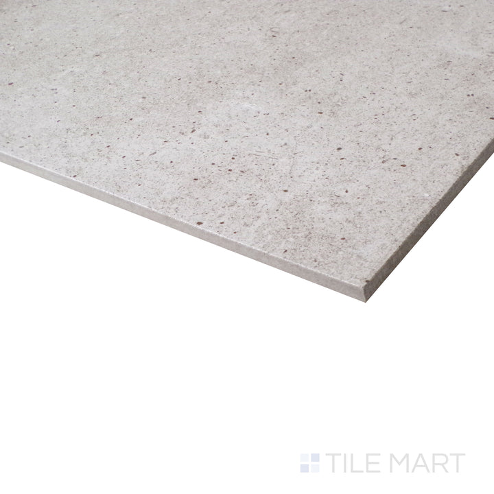 An angled shot highlights the muted sage green hues, with a honed finish that softens the look for a natural appeal.