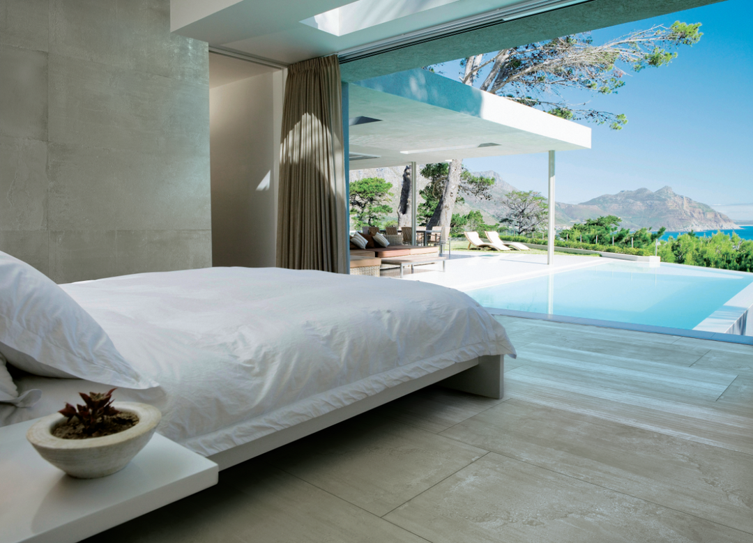 A calming lifestyle composition with Ecocrete Sage honed porcelain, exuding a soft, earthy touch to contemporary designs.