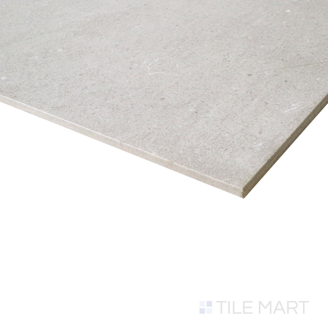 A close-up angle enhances the aqua hues of this honed porcelain tile, bringing out its smooth yet dynamic surface.