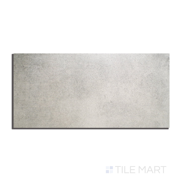Overhead composition of Ecocrete Sage 18X36 Honed Porcelain, featuring a muted green tone with a honed texture, bringing a calming, nature-inspired feel to interiors.
