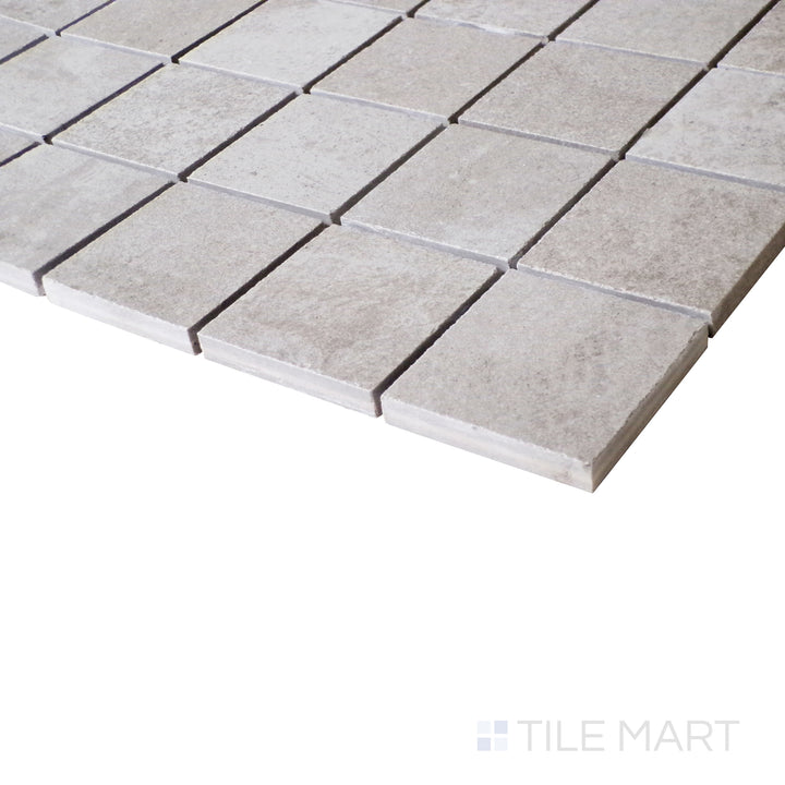 A side-view perspective highlights the mosaic arrangement, with the soft aqua hues creating a serene and balanced appearance.