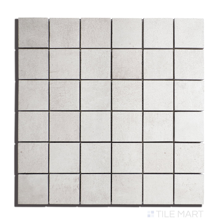 Aerial shot of Ecocrete Melted Ice 2" Square Matte Porcelain Mosaic, showcasing small-format neutral tiles with a matte surface, designed for detailed, creative applications.