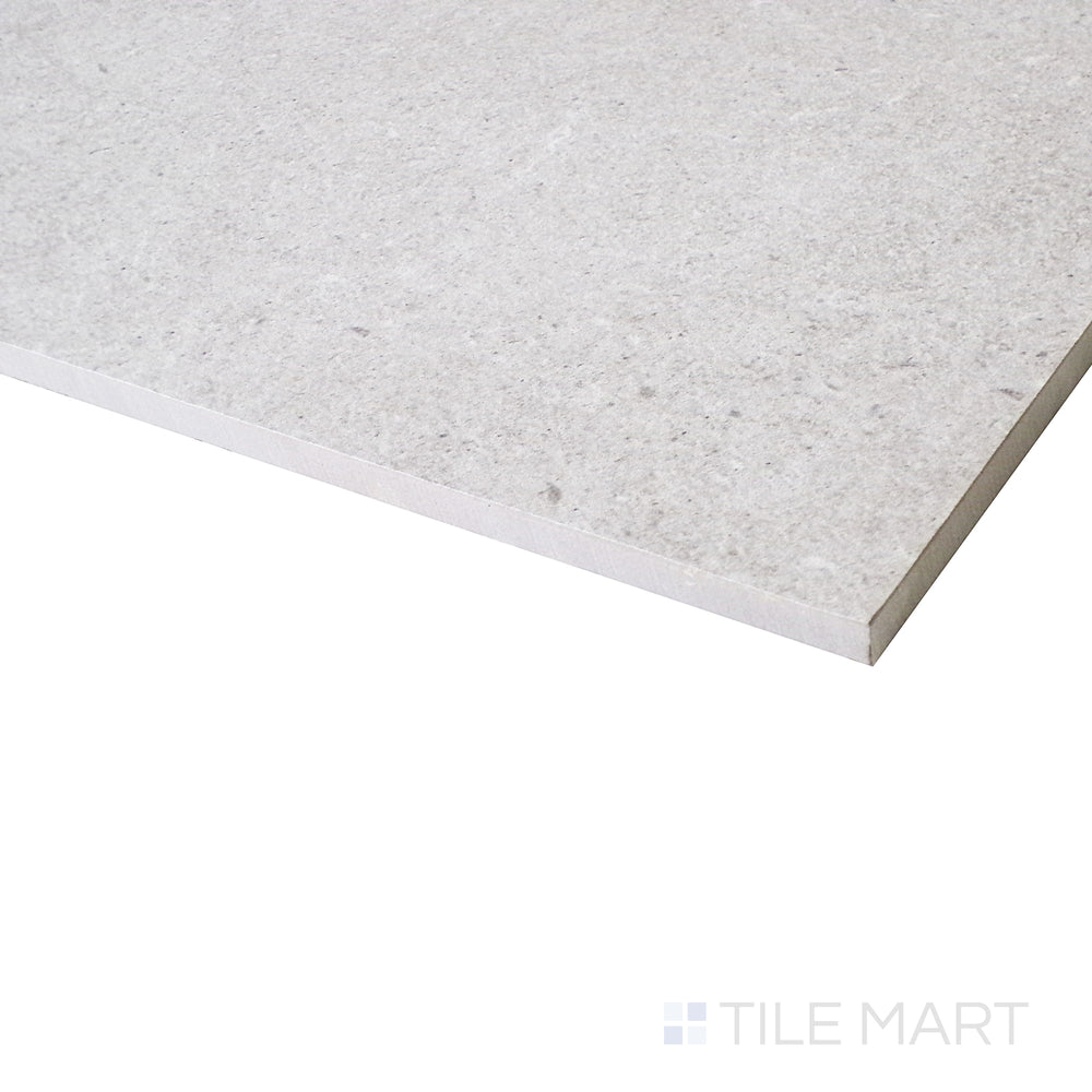 A side-angle shot enhances the warm almond tones, highlighting the soft matte surface and its natural stone-like finish.