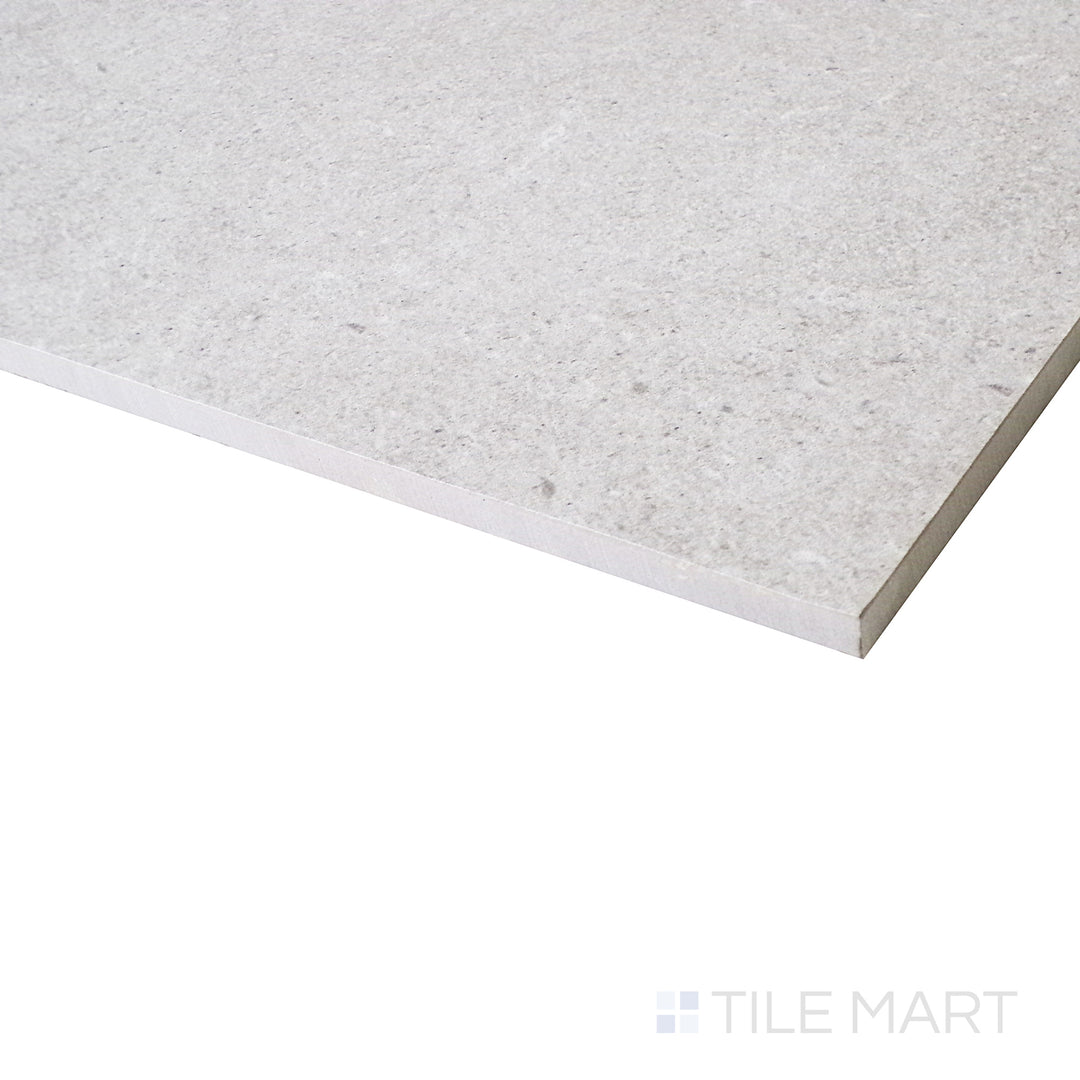 A side-angle shot enhances the warm almond tones, highlighting the soft matte surface and its natural stone-like finish.