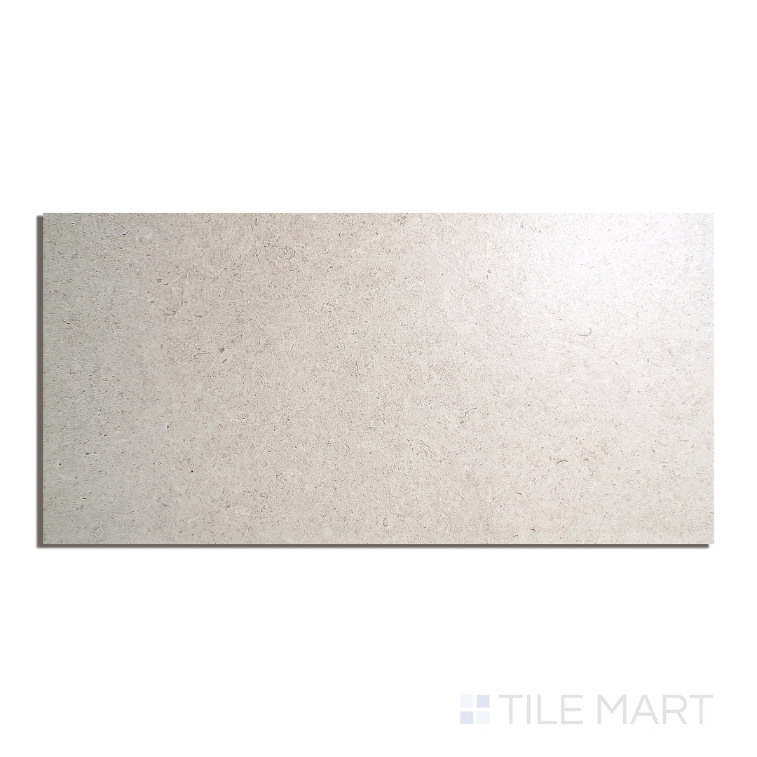 Overhead shot of Epika Almond 12X24 Matte Porcelain, a warm almond-colored tile with a smooth matte finish, bringing earthy tones to any space.
