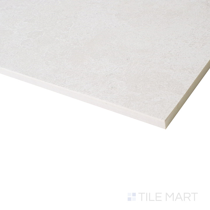 A softly lit angled perspective showcases the shell-colored surface, emphasizing the smooth matte finish and elegant simplicity.