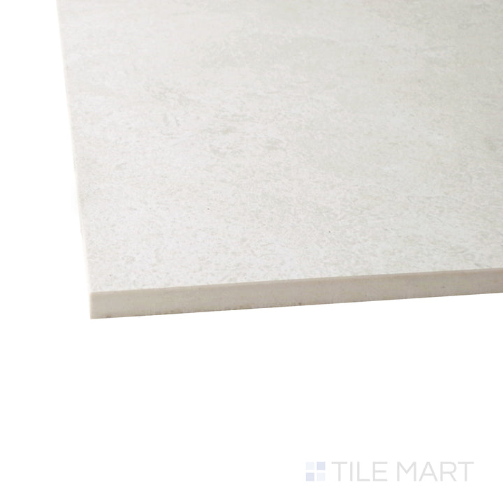 A corner shot of the Epika Ivory 12x24 matte porcelain tile highlights its creamy ivory hue and smooth matte texture, delivering a clean and sophisticated aesthetic.
