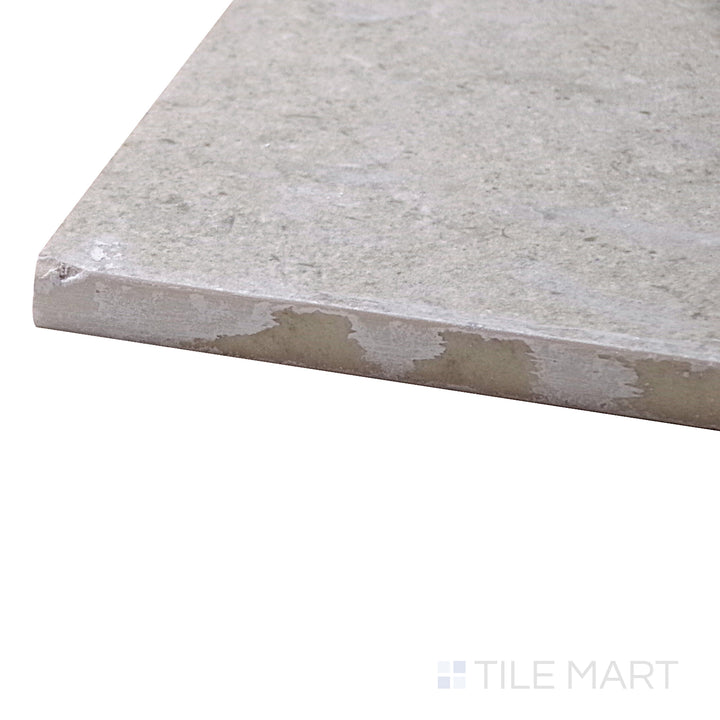 Captured from a corner angle, the Epika Almond 48x48 matte porcelain tile showcases its natural almond-beige tone and large format, ideal for expansive, modern interiors.