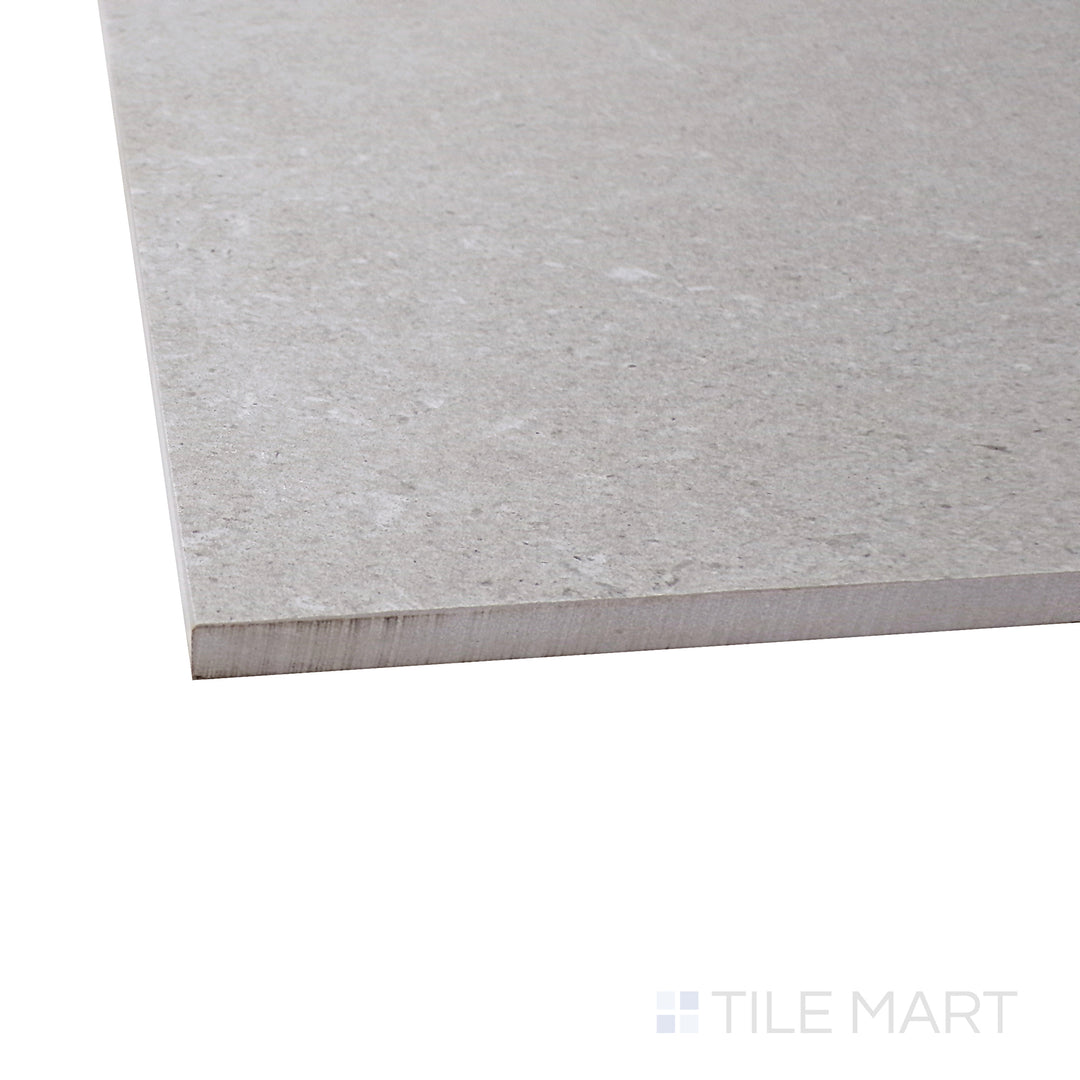 A corner perspective of the Epika Pearl 48x48 matte porcelain tile emphasizes its soft, pearl-inspired shade and smooth matte finish, adding a touch of elegance to large-scale applications.