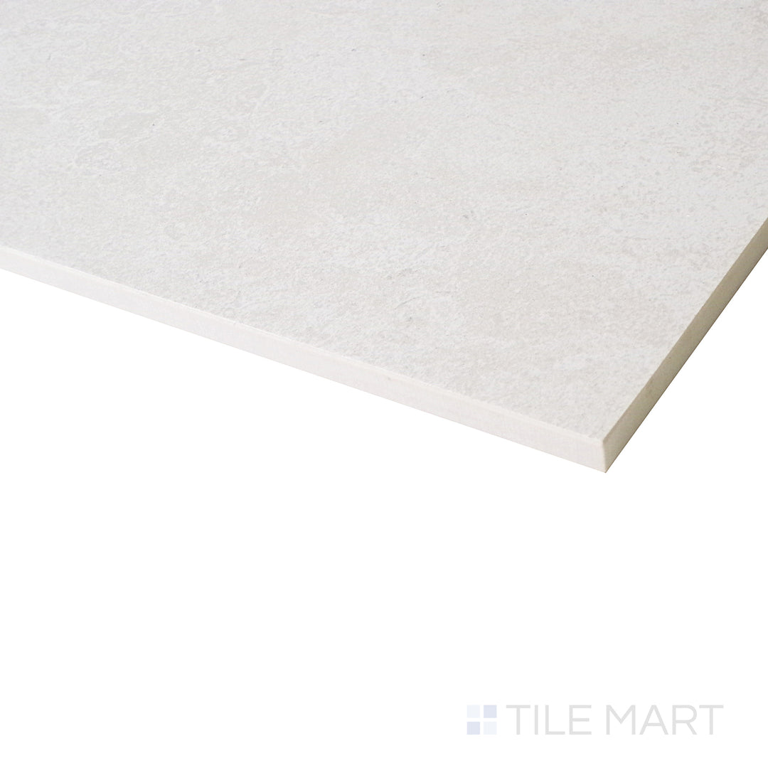 An angled close-up captures the warmth of ivory hues, enhancing the natural stone-like surface with its soft matte finish.