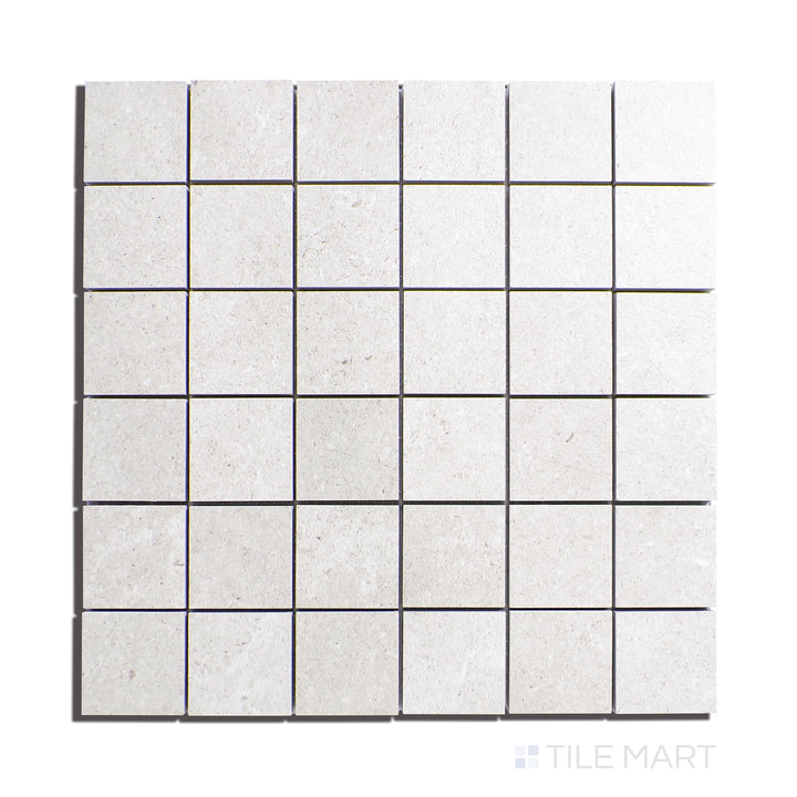 Flat lay of Epika Pearl 2" Square Matte Porcelain Mosaic, displaying delicate pearl tones in a refined mosaic format, perfect for subtle yet sophisticated designs.