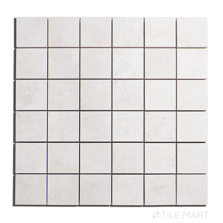 Top-view of Epika Ivory 2" Square Matte Porcelain Mosaic, offering a classic ivory shade in a mosaic arrangement, blending seamlessly into various design styles.