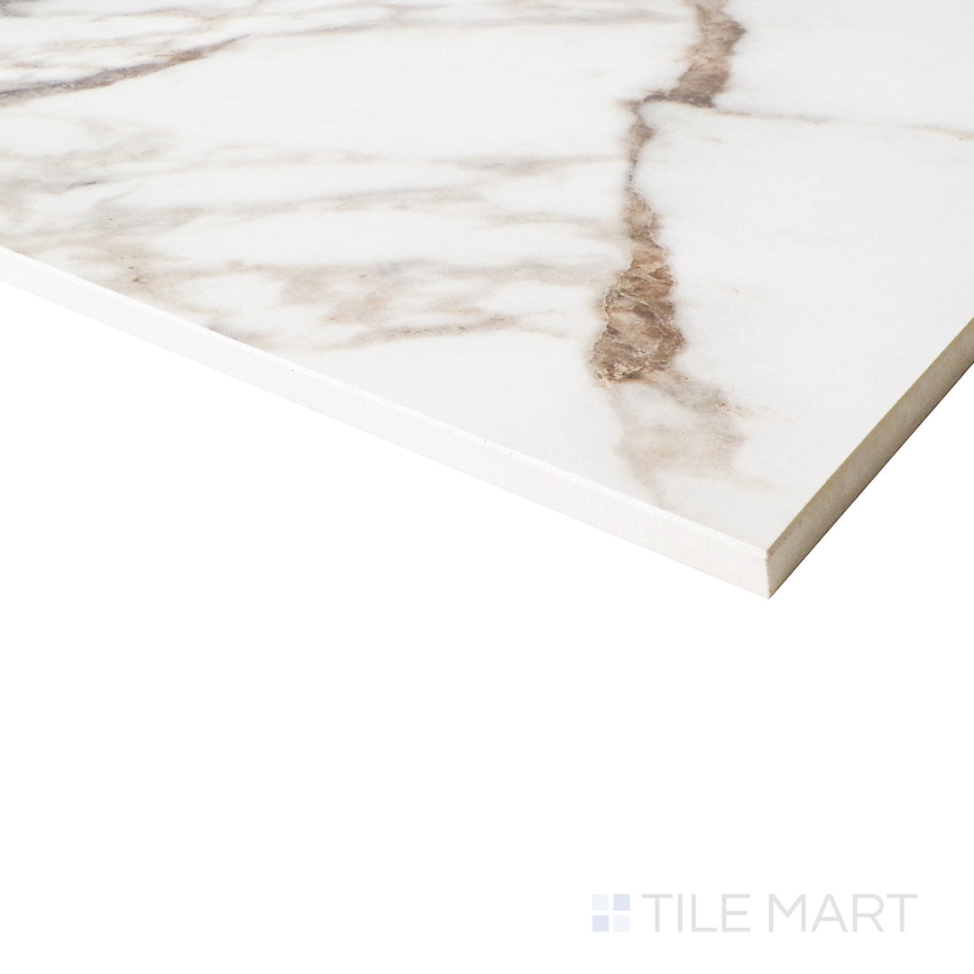 An angled perspective enhances the elegant white backdrop and intricate Arabescato marble-inspired veins with a radiant polished finish.